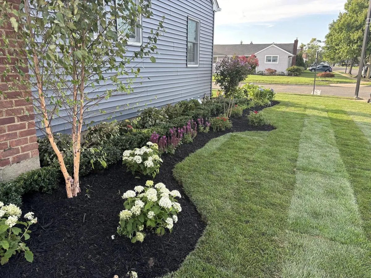Flowers, fresh mulch and finished bed edges